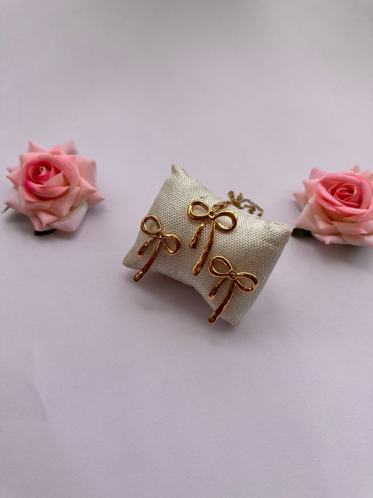 Anouka Long Bow Charm Pendant & Earrings Set