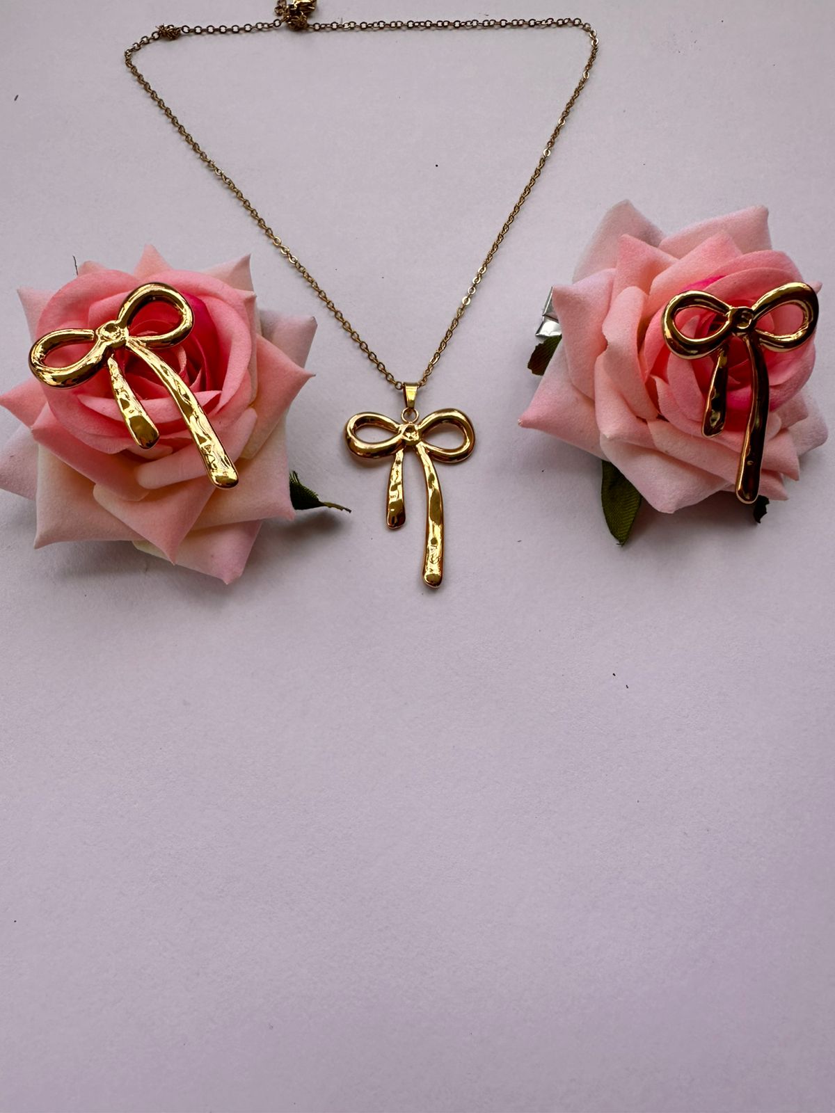 Anouka Long Bow Charm Pendant & Earrings Set